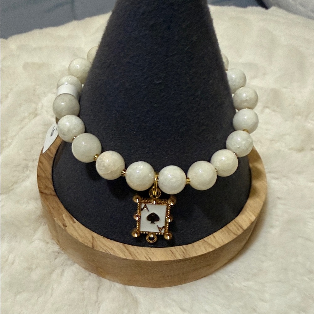 NWOT Elegant White Quartz 8mm Beaded Bracelet with Gold Tone Ace of Spades